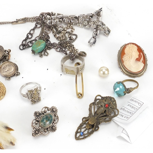 234 - Assorted jewellery including gold coloured metal earrings, silver brooches and a coin bracelet