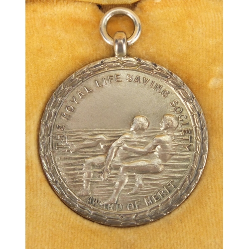 495 - Silver Royal Life Saving Society Award of Merit - J.E Buss 1931, 3.2cm in diameter