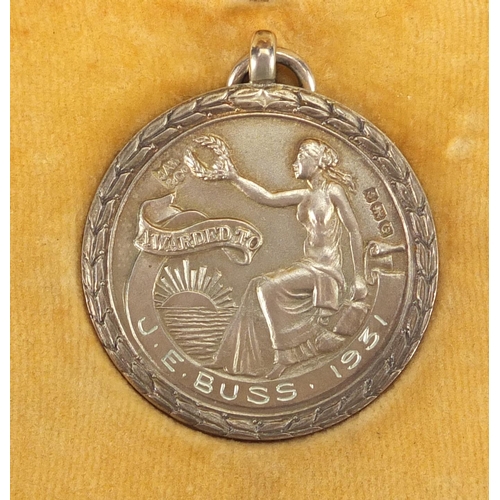 495 - Silver Royal Life Saving Society Award of Merit - J.E Buss 1931, 3.2cm in diameter