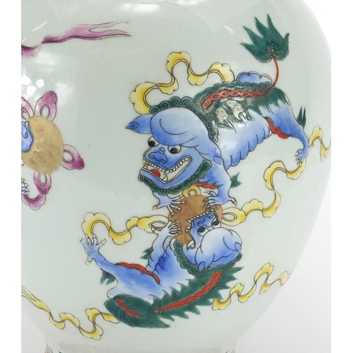 417 - Chinese porcelain baluster vase, hand painted in the famille rose palette with kylin lions chasing t... 