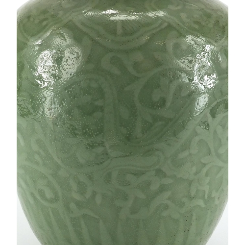 458 - Chinese porcelain celadon glazed vase, decorated under glaze with dragons amongst foliage, 32.5cm hi... 