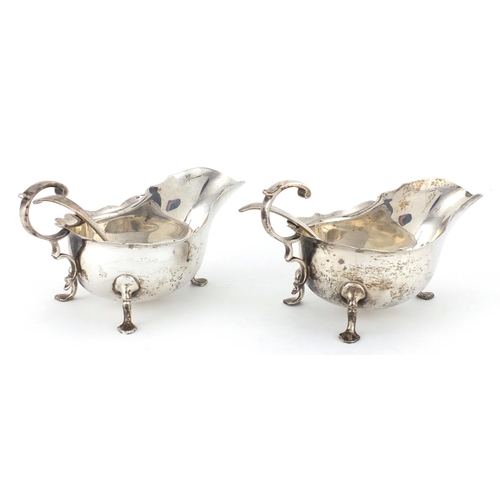 742 - Pair of silver three footed sauce boats with ladles, retailed by Rainforth & Son Newport, Sheffield ... 