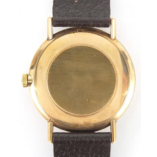 921 - Gentleman's 9ct gold Omega Geneve wristwatch, numbered 29870844 to the movement, 3.4cm in diameter, ... 