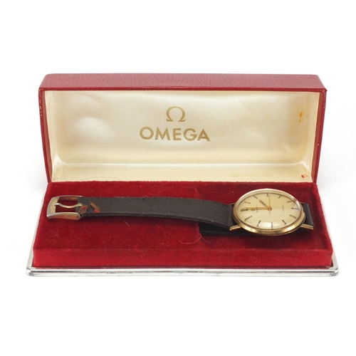 921 - Gentleman's 9ct gold Omega Geneve wristwatch, numbered 29870844 to the movement, 3.4cm in diameter, ... 