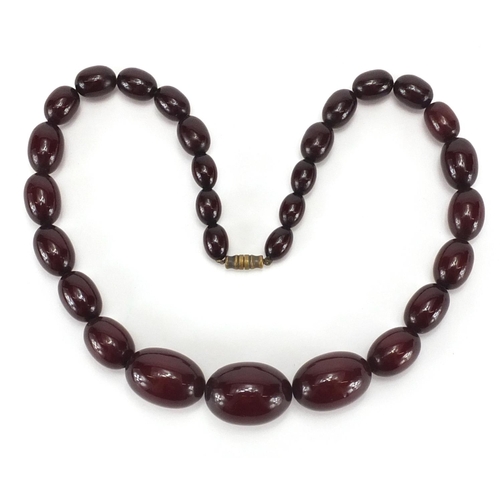 914 - Cherry amber coloured bead necklace, 44cm in length, approximate weight 44.5g