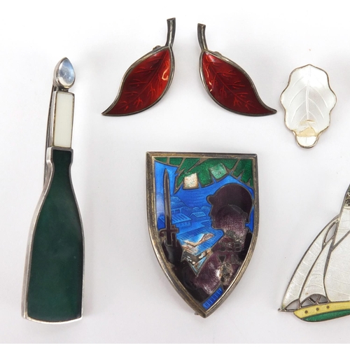 898 - Silver and enamel jewellery including a pair of David Anderson earrings, champagne bottle brooch and... 