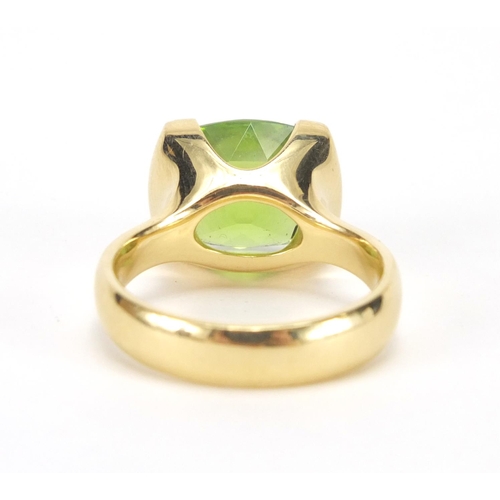 794 - 18ct gold and Peridot ring, size N, with Rox gems and jewellery insurance valuation approximate weig... 