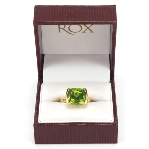 794 - 18ct gold and Peridot ring, size N, with Rox gems and jewellery insurance valuation approximate weig... 