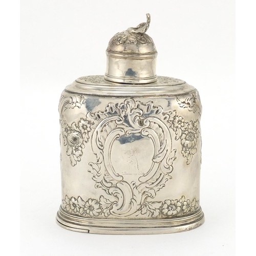 725 - Continental silver canister embossed with flowers, probably Dutch, stamped marks to the base, 13.5cm... 