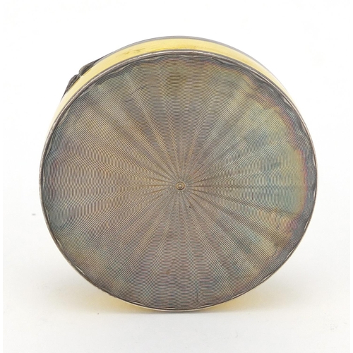 6 - Circular silver and yellow guilloche enamel box with hinged lid, C & C 925 import mark, 6cm in diame... 