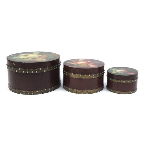 2121 - Nest of three hand painted circular hat boxes, the largest 20cm high x 34.5cm in diameter