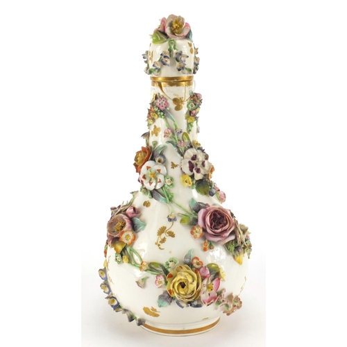 591 - 19th century Sevres floral encrusted porcelain bottle vase and cover, hand painted and gilded with f... 