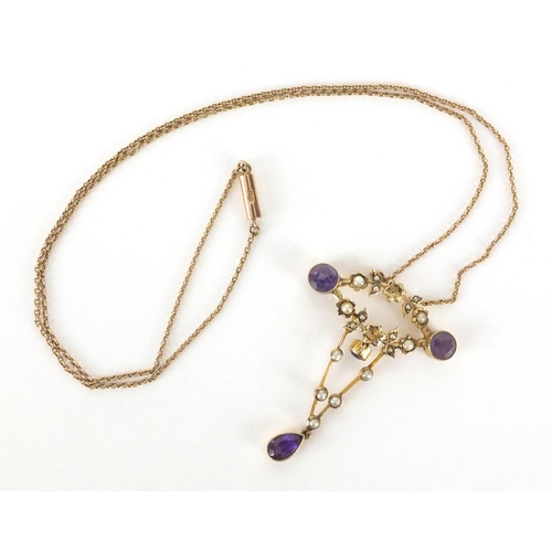 838 - Art Nouveau 9ct gold amethyst and seed pearl pendant on a 9ct gold necklace, the pendant 4cm in leng... 