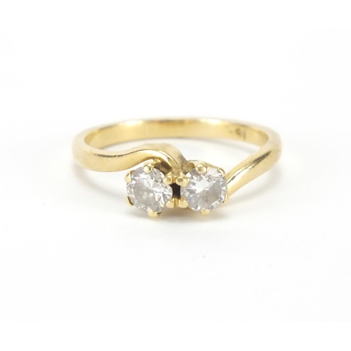 883 - 18ct gold diamond crossover ring, size K, approximate weight 2.8g