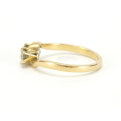 883 - 18ct gold diamond crossover ring, size K, approximate weight 2.8g