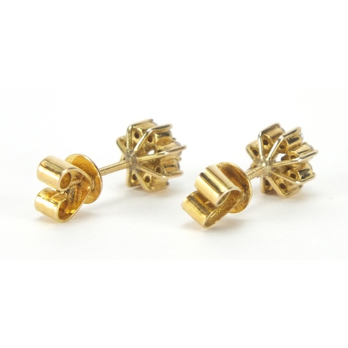 808 - 14ct gold diamond flower head ring and earrings, the ring size M, approximate weight 6.5g