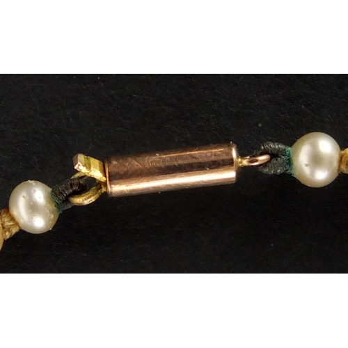 845 - Single string pearl necklace with 9ct gold clasp, 76cm in length, approximate weight 18.4g