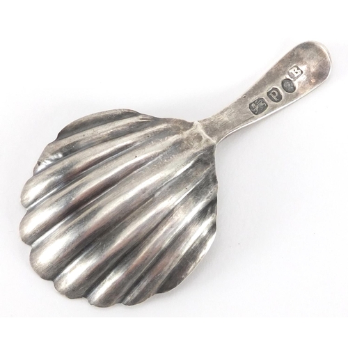 761 - Georgian silver caddy spoon with shell shaped bowl, indistinct hallmark, 7cm in length, approximate ... 