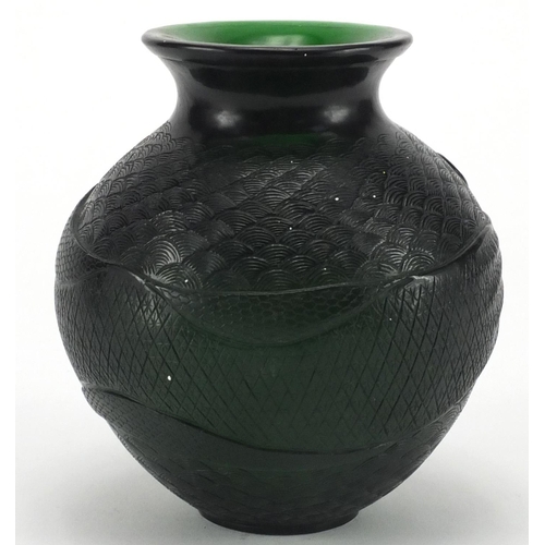 486 - Chinese green Peking glass vase, of ovoid form decorated with crashing waves, 12.5cm high