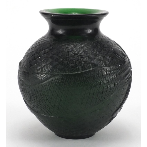 486 - Chinese green Peking glass vase, of ovoid form decorated with crashing waves, 12.5cm high