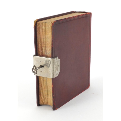 30 - Red Moroccan leather bound Asprey and Houghton & Gunn's 1908 diary, with silver plated lockable clas... 