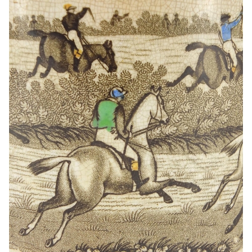 611 - Victorian Staffordshire pottery loving cup transferred printed and hand coloured with a horse racing... 