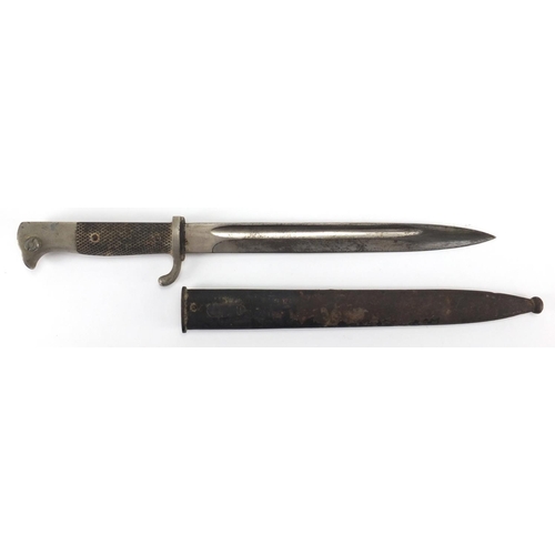 345 - German Military interest Solingen bayonet and scabbard, the steel blade with impressed marks, 40.5cm... 