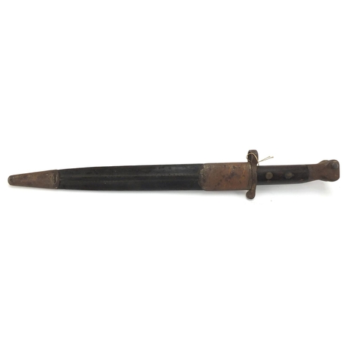 344 - British Military bayonet and scabbard with wooden grip, the steel blade with impressed marks, 44cm i... 