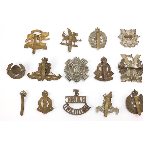 313 - British Military interest cap badges including Royal Artillery, Leicestershire, Royal Army Ordnance ... 