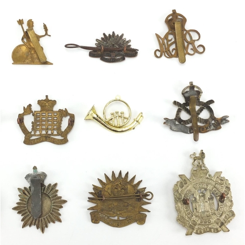 313 - British Military interest cap badges including Royal Artillery, Leicestershire, Royal Army Ordnance ... 