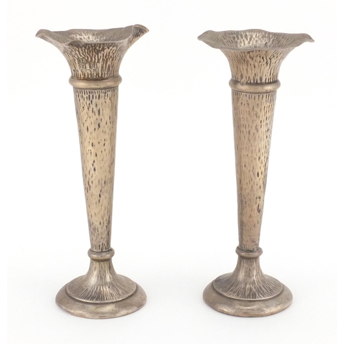 747 - Pair of fluted silver bud vases with planished decoration, A & JZ Birmingham 1904, 18cm in length, a... 