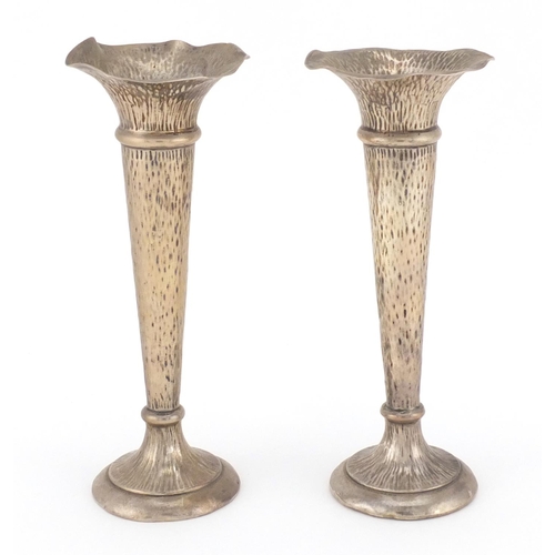 747 - Pair of fluted silver bud vases with planished decoration, A & JZ Birmingham 1904, 18cm in length, a... 