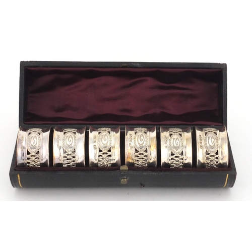 775 - Set of Victorian silver napkin rings with pierced decoration, H A Sheffield 1864, with fitted case, ... 