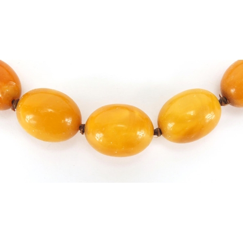 905 - Butterscotch amber coloured bead necklace, 44cm in length, approximate weight 47.8g