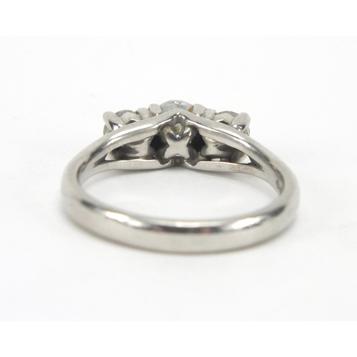 793 - Mappin & Webb platinum diamond three stone ring, size N, with GIA report, approximate weight 7.9g