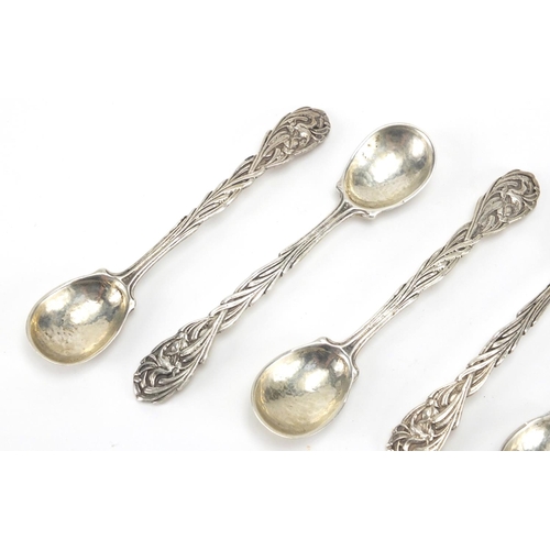 717 - Omar Ramsden set of six silver teaspoons with naturalistic terminals and planished bowls, London 193... 