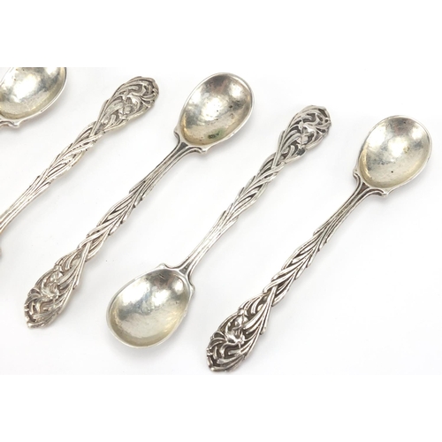 717 - Omar Ramsden set of six silver teaspoons with naturalistic terminals and planished bowls, London 193... 