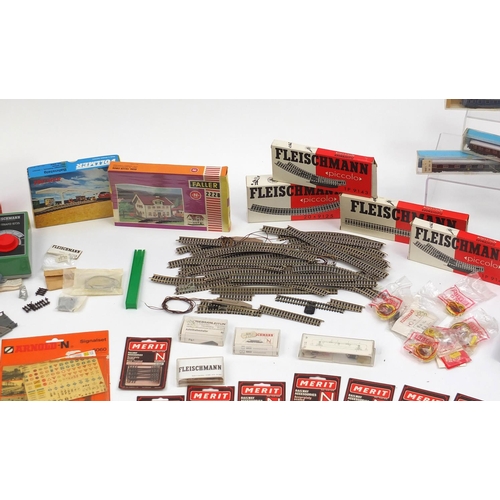 394 - Fleischmann N gauge model railway and accessories including tenders, advertising wagons and track