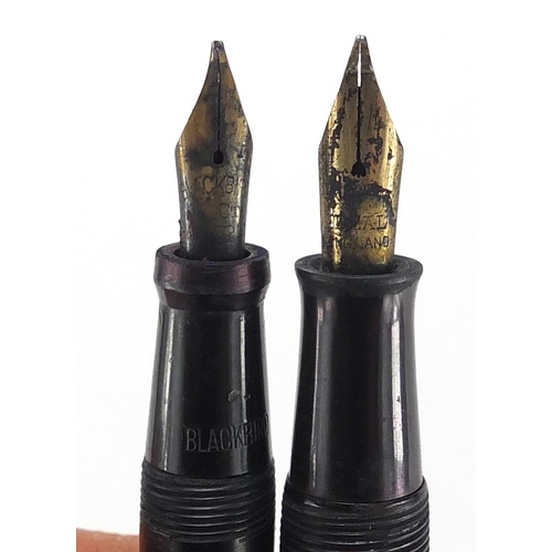 67 - Five vintage black fountain pens including Waterman's and Blackbird self-filler, two with gold nibs