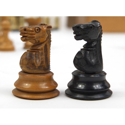 385 - Vintage chess sets, pieces and dominoes including carved bone chess pieces, Staunton and Chavet, mos... 