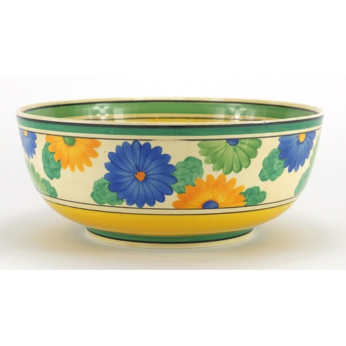 643 - Clarice Cliff Sun Gay bowl hand painted with blue and yellow flowers, factory marks to the base, 24.... 