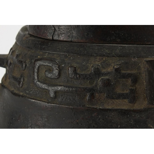 468 - Antique Chinese archaic bronze wine vessel having a stylised bands, with remnants of red paint, 19.5... 