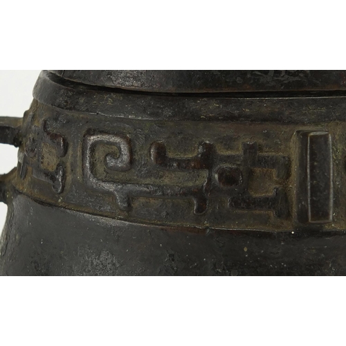 468 - Antique Chinese archaic bronze wine vessel having a stylised bands, with remnants of red paint, 19.5... 