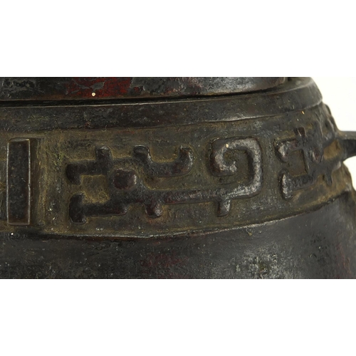 468 - Antique Chinese archaic bronze wine vessel having a stylised bands, with remnants of red paint, 19.5... 