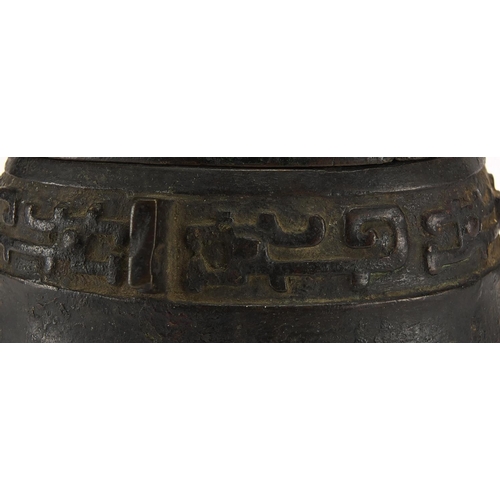 468 - Antique Chinese archaic bronze wine vessel having a stylised bands, with remnants of red paint, 19.5... 