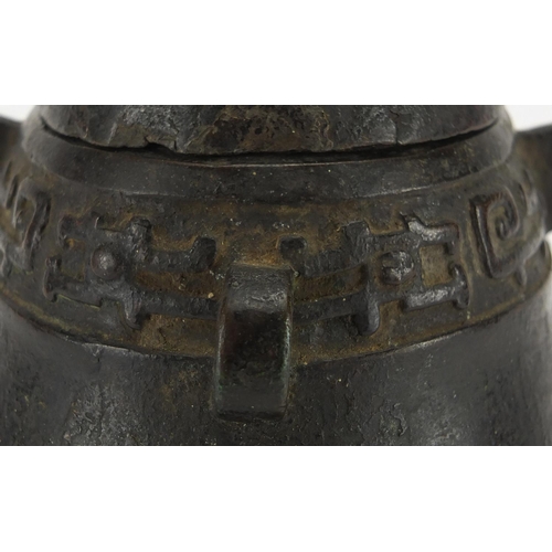 468 - Antique Chinese archaic bronze wine vessel having a stylised bands, with remnants of red paint, 19.5... 