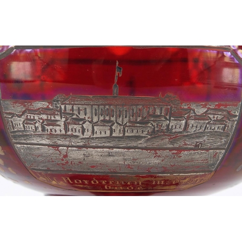 621 - 19th century Bohemian ruby red glass tazza, silvered and gilded with panels of buildings, 13.5cm hig... 