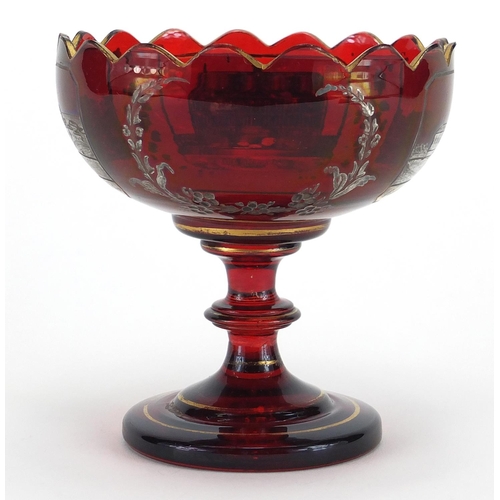 621 - 19th century Bohemian ruby red glass tazza, silvered and gilded with panels of buildings, 13.5cm hig... 