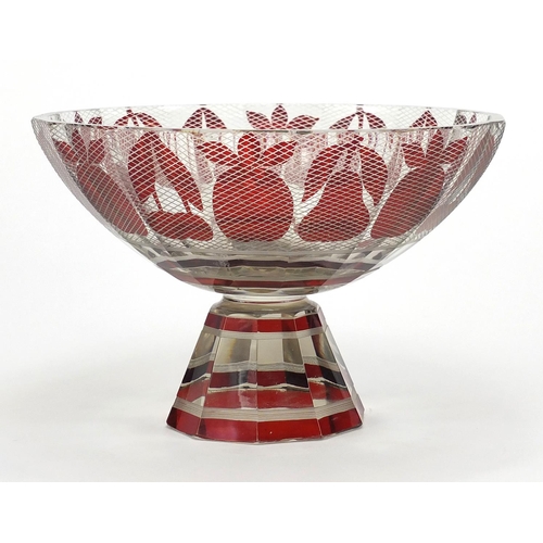 622 - Continental red and clear glass pedestal bowl, decorated with a band of fruit and cut lace work desi... 