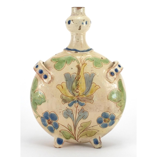 594 - Continental pottery flask with twin handles, hand painted and incised with stylised flowers, 24cm hi... 